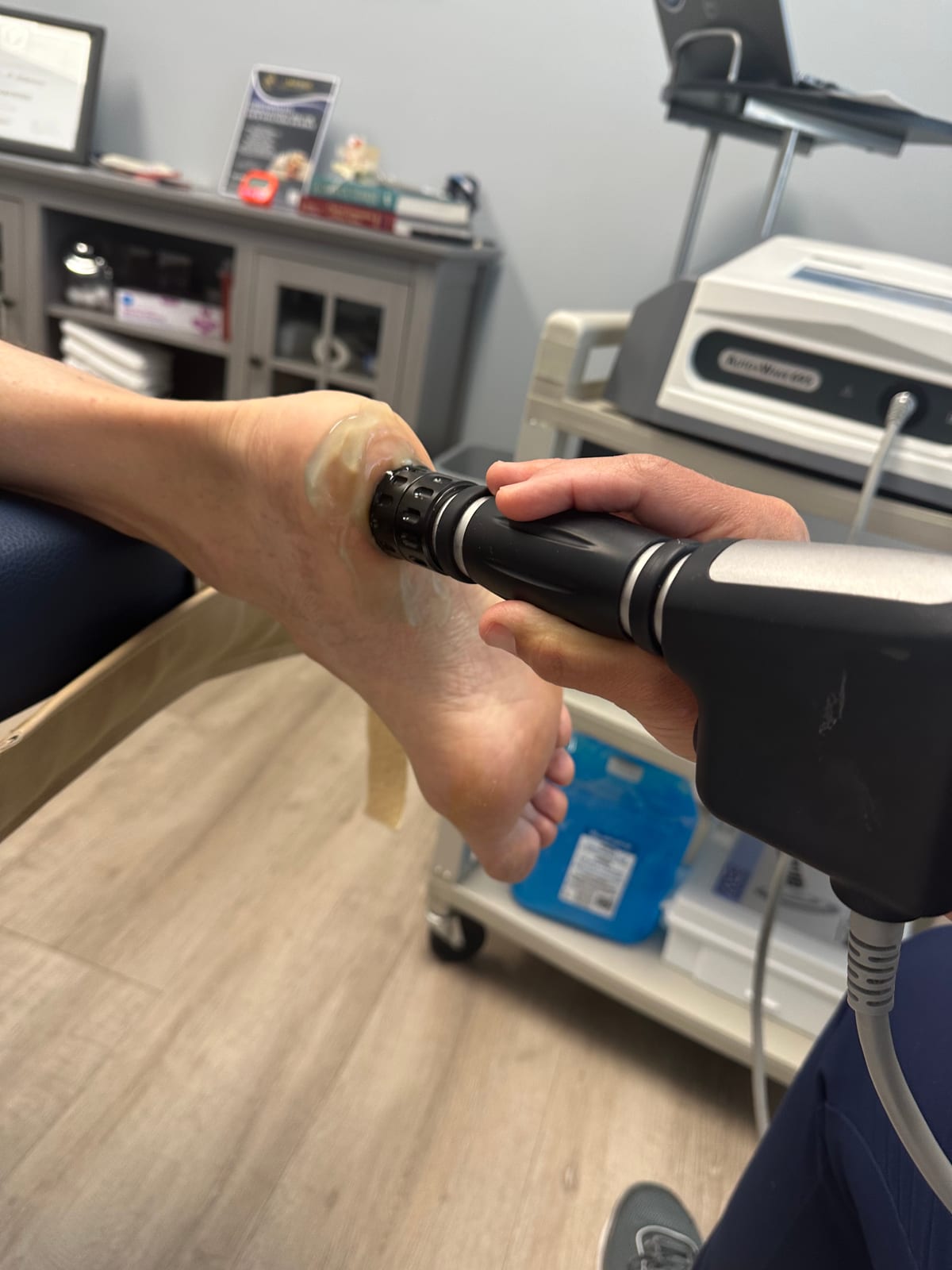 Shockwave therapy applied to the ankle at Lakeside Sports Chiropractic + Physical Therapy